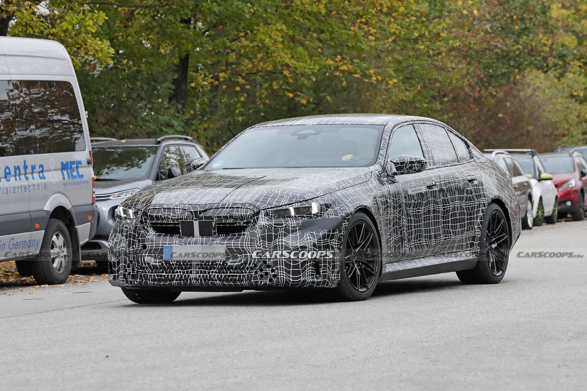 Spy Images Capture the 2024 BMW M5 Hybrid Sporting Production Bodywork