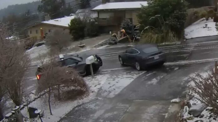 Cars slide down a hill in Seattle