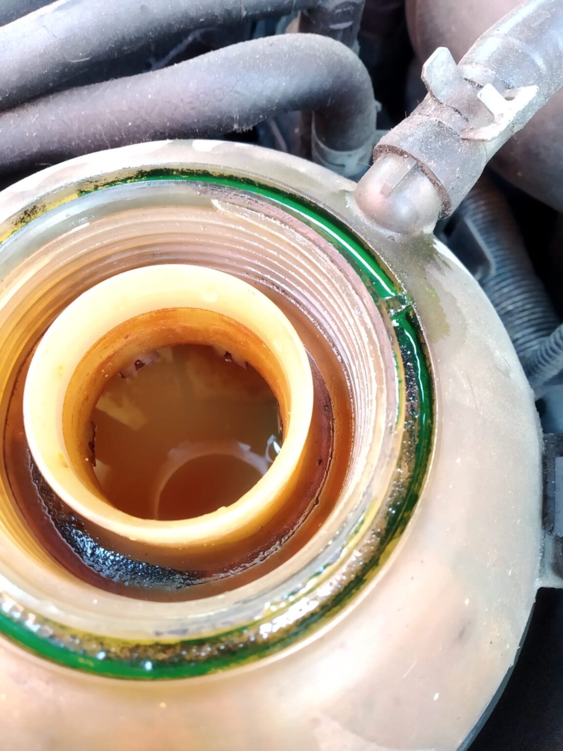 Why does the water in the radiator turn brown? New Electric Autos