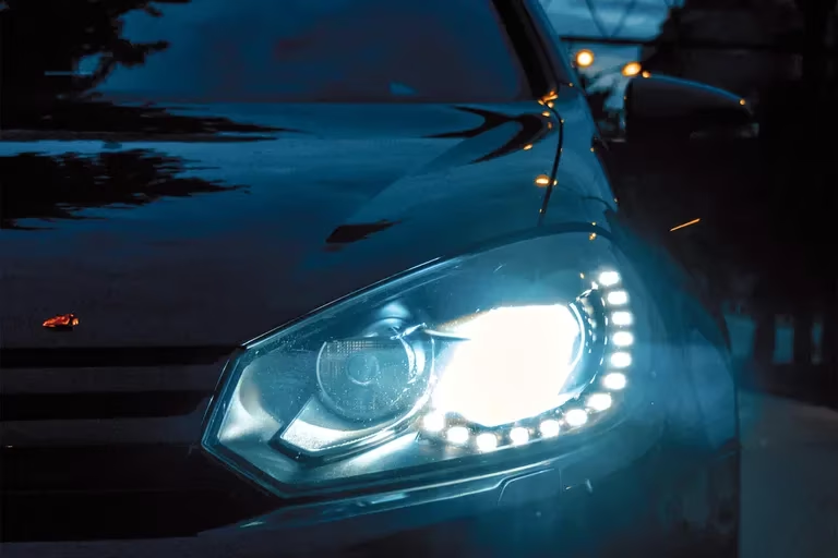 Why do car lights come on by themselves?